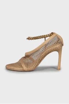 Beige sandals decorated with mesh