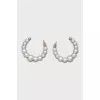 Massive earrings made of artificial pearls