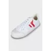 White sneakers with leather inserts
