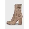 Suede ankle boots decorated with rhinestones