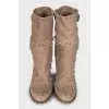 Suede ankle boots decorated with rhinestones