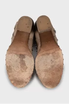 Suede ankle boots decorated with rhinestones