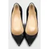 Black high heel pumps