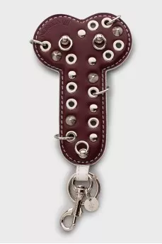 Keychain decorated with eyelets and spikes