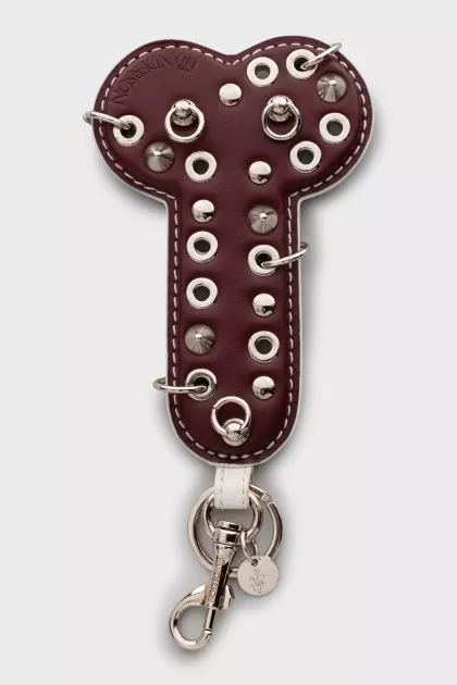 Keychain decorated with eyelets and spikes