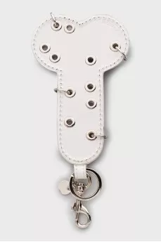 Keychain decorated with eyelets and spikes