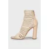 Ankle boots with heels and woven inserts