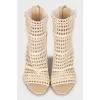 Ankle boots with heels and woven inserts