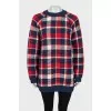 Checkered sweater with tag