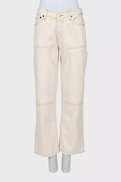 Jeans with contrast seams and tag