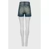 Shorts with raw edge and tag