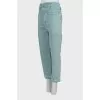 Green jeans with tag