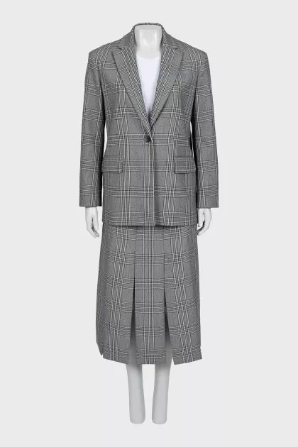 Checkered suit consisting of a jacket, trousers and skirt