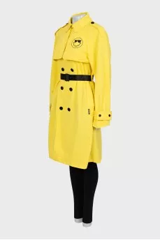 Fitted yellow trench coat with logo