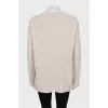 Knitted jumper with silk insert