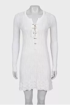 Knitted dress decorated with lacing