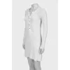 Knitted dress decorated with lacing