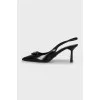 Leather slingbacks with signature decor