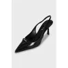 Leather slingbacks with signature decor