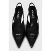 Leather slingbacks with signature decor