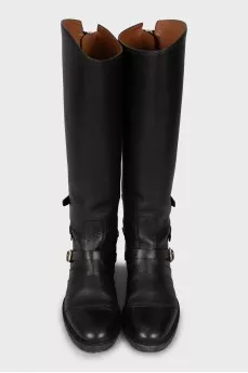 Leather boots with gold buckles