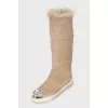 Insulated boots with decorative toes