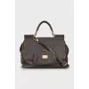 Leather satchel bag with gold hardware
