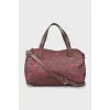 Eco-leather bag with a signature print