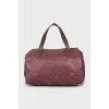 Eco-leather bag with a signature print