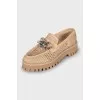 Leather loafers with chunky chain