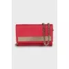 Pink leather crossbody bag