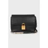 Leather bag with gold clasp