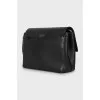 Leather bag with gold clasp