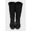 Suede boots with branded embossing