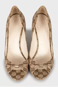 Wedge shoes with signature print