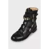 Leather boots with gold chain