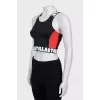 Sports top with brand logo