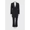 Black suit consisting of a jacket and trousers