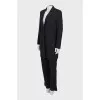Black suit consisting of a jacket and trousers