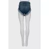Cropped denim shorts with fringe