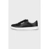 Black leather sneakers with brand logo