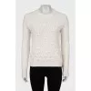 Knitted sweater with decorative embroidery
