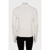 Knitted sweater with decorative embroidery