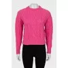 Knitted sweater with relief pattern