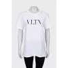 White oversized t-shirt with branded print