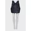 Leather skirt decorated with a bow
