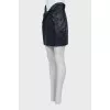 Leather skirt decorated with a bow
