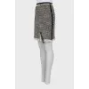 Pencil skirt decorated with fringe