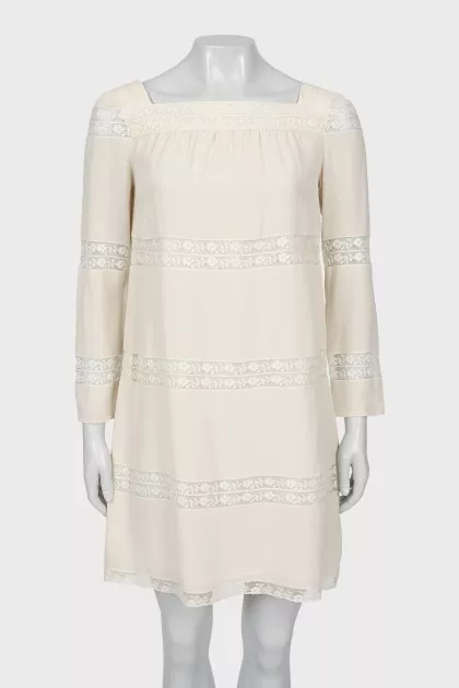 Straight dress with lace inserts
