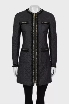 Quilted jacket decorated with fringe